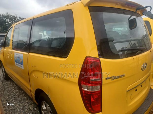 Hyundai Starex 2013 Yellow · Photo 3