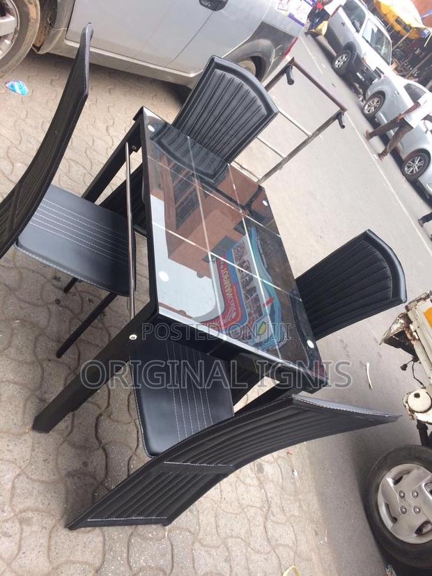 Glass Dinning Table With 4 Chairs · Photo 1