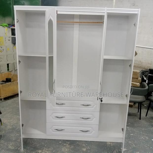 Foreign 4-Doors Wooden Wardrobe · Photo 1