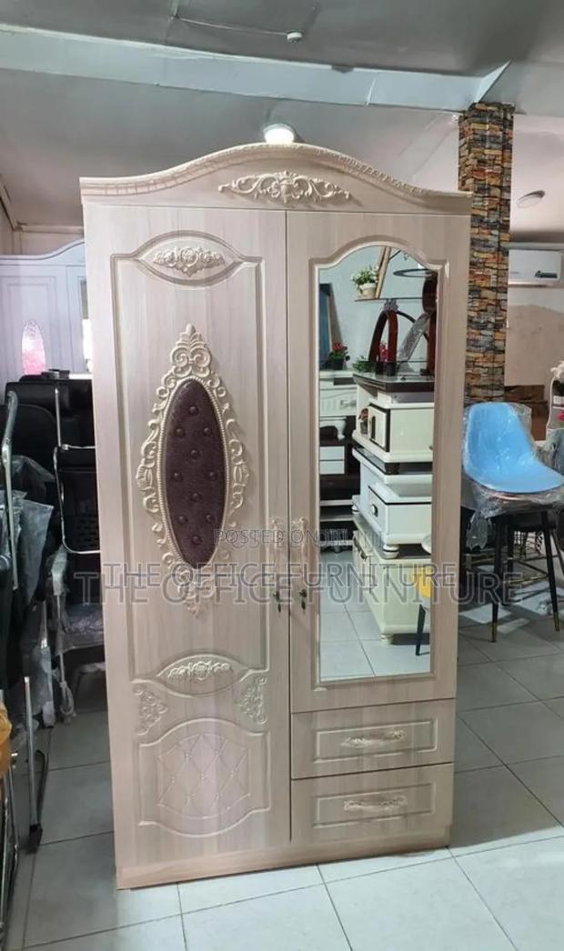 Light-Colored, Two-Door Wardrobe · Photo 1
