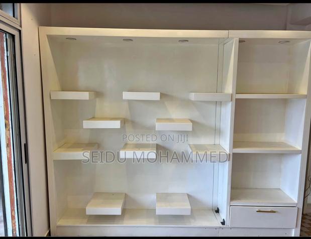 A Design Hairs, Bags and Shoe Racks · Photo 1