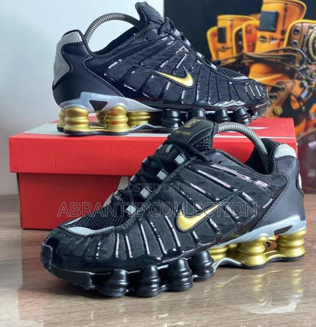Nike Shox Tl Black/Gold Sneaker · Photo 1