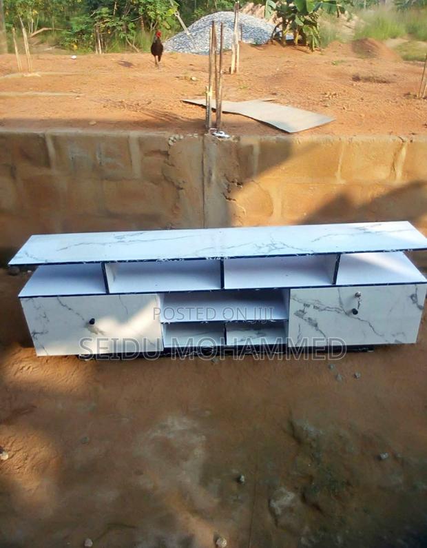 A Design Standard Tv Stand · Photo 1