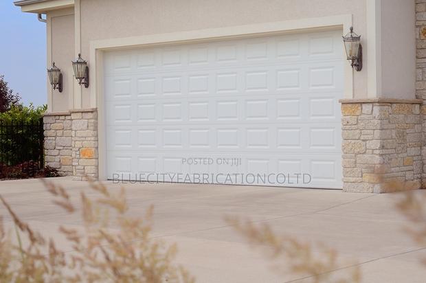 Double Panel Garage Door · Photo 1