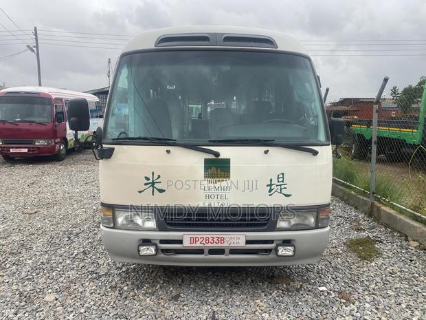 Toyota Coaster 2014 Green · Photo 3