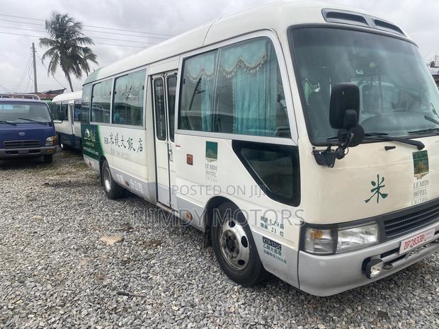 Toyota Coaster 2014 Green · Photo 4