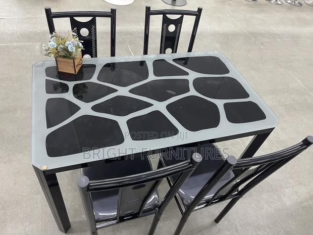 Dining Sets/ Four Seater Glass Dining Table With 4 Chairs · Photo 1