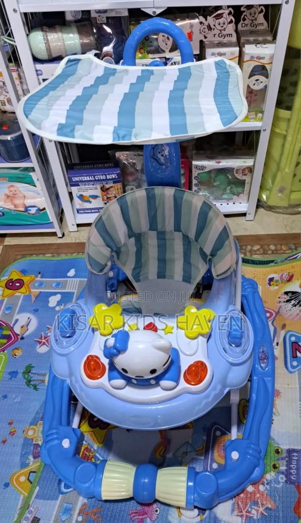 Fashion Baby Walker With Music, Foot Mat, and Umbrella · Photo 2