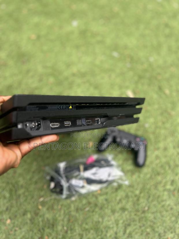 Playstation 4 Pro ( Read the Description) · Photo 3