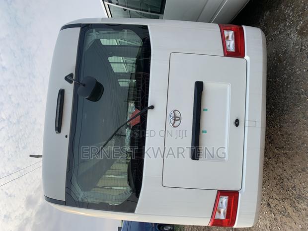 New Toyota Coaster 2024 White · Photo 3
