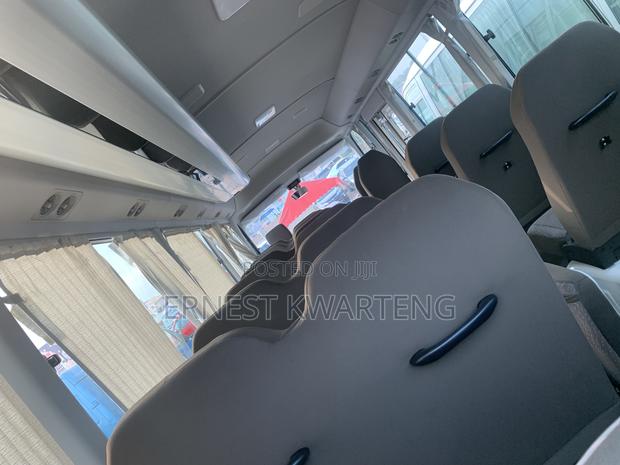 New Toyota Coaster 2024 White · Photo 7