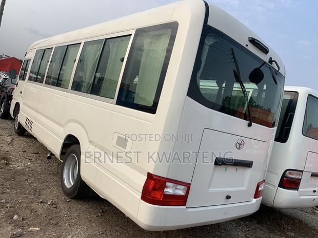 New Toyota Coaster 2024 White · Photo 8