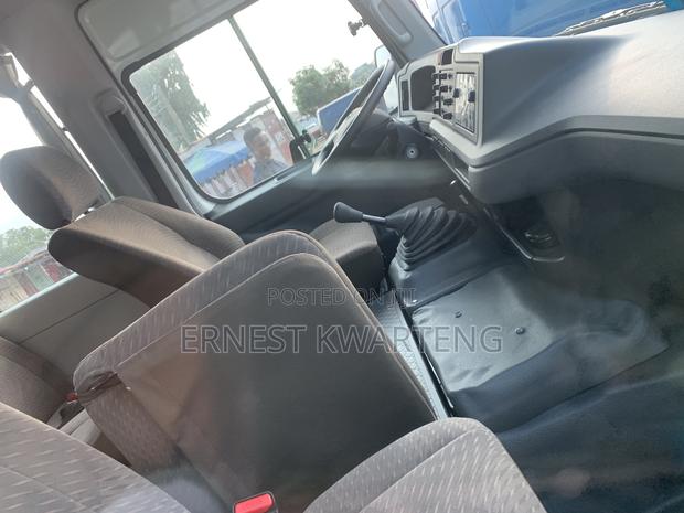New Toyota Coaster 2024 White · Photo 6