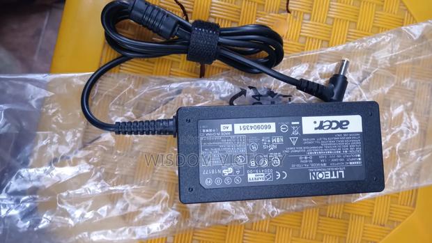 Accer Laptop Charger Available Complete With Cord. · Photo 1