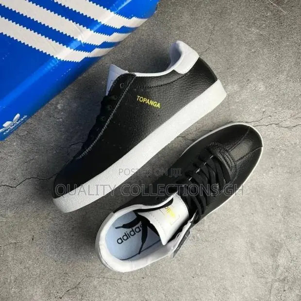 Black and Cream Adidas Topanga · Photo 1