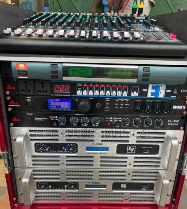 Full Set of Amplifiers in Rack With Mixer Cabling · Photo 1