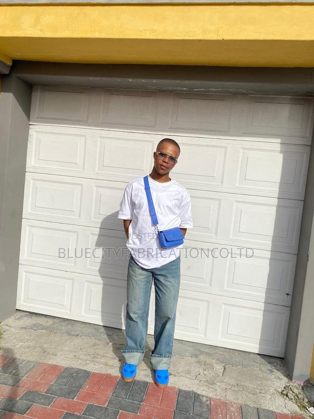 Canadian Automated Garage Door With Two Remote · Photo 2