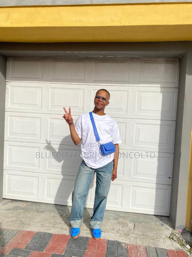 Automatic Garage Door With Two Remote All Size Available · Photo 1
