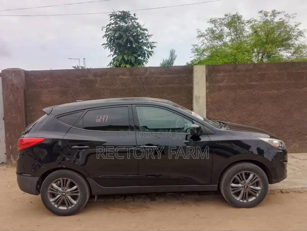 Hyundai Tucson GLS AWD 2015 Black · Photo 4