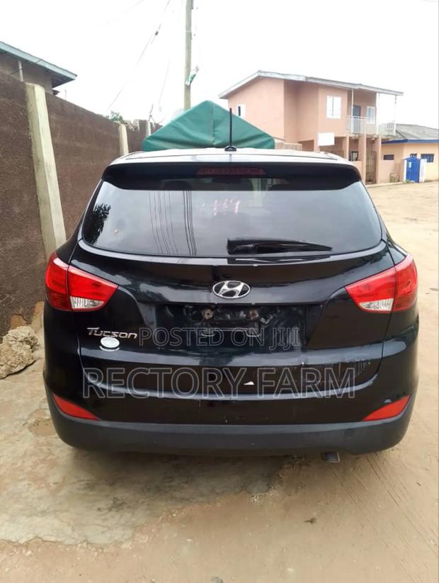 Hyundai Tucson GLS AWD 2015 Black · Photo 1