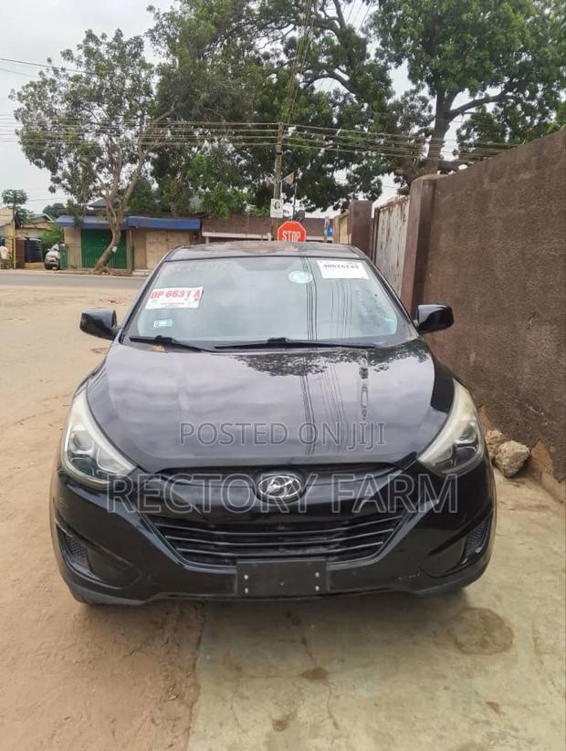 Hyundai Tucson GLS AWD 2015 Black · Photo 2