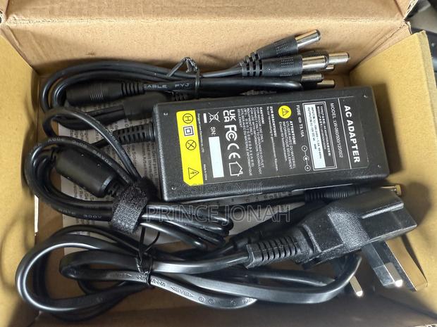 Aryee 60w Ac Adapter Charger Power Supply 12v 5a, 5.5x2.5mm · Photo 1