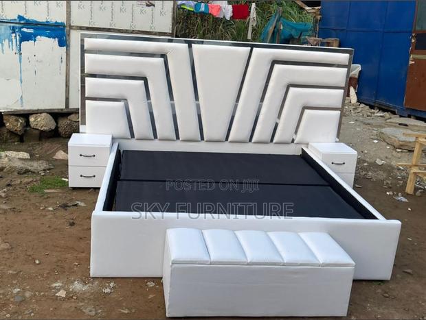 Lullaby Queen-Size Bed Frame With Side Drawers and Ottoman · Photo 1
