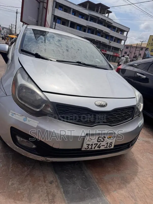 Kia Rio LX 4dr Sedan (1.6L 4cyl 6M) 2013 Silver · Photo 1