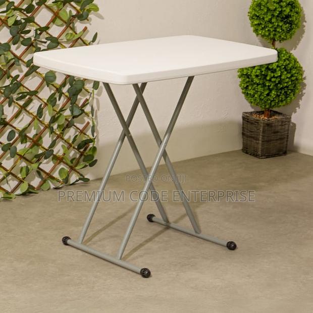 Adjustable Folding Plastic Garden Table · Photo 1