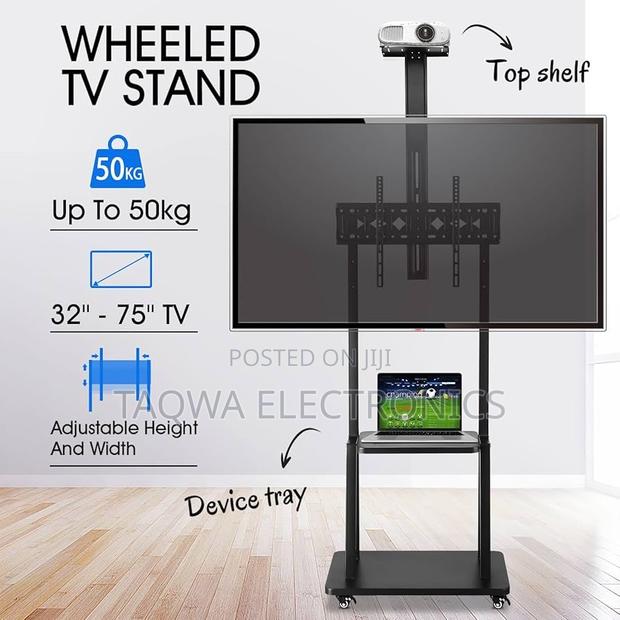 Carries Up to 75 Inches Universal Movable Tv Bracket · Photo 1