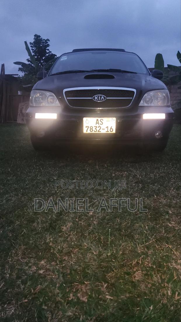 Kia Combi 2006 Black · Photo 3