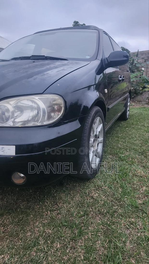 Kia Combi 2006 Black · Photo 4
