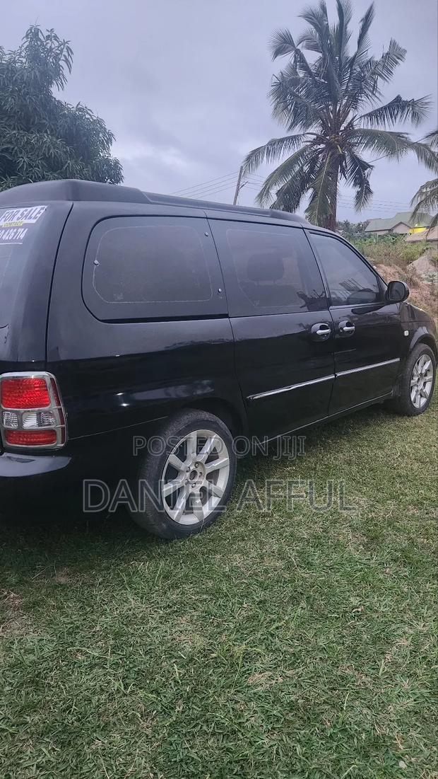 Kia Combi 2006 Black · Photo 5