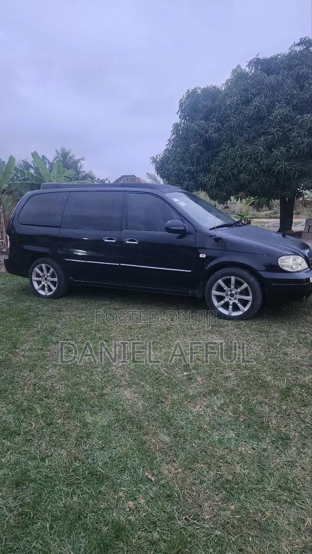 Kia Combi 2006 Black · Photo 7