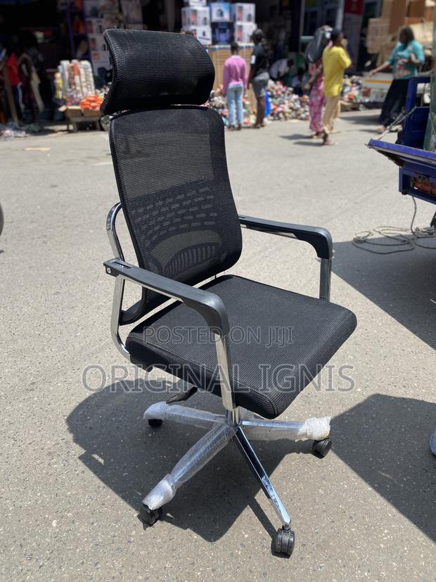 Office Swivel Chair With Headrest · Photo 1
