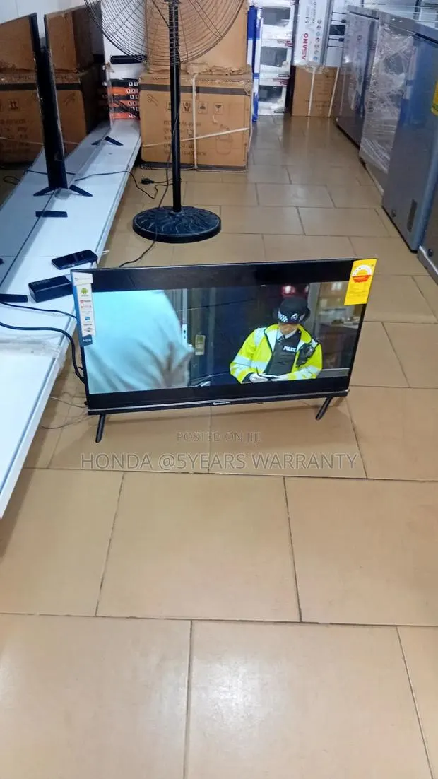 Enjoy More With Dolphine Bay 32" Smart Tv · Photo 1