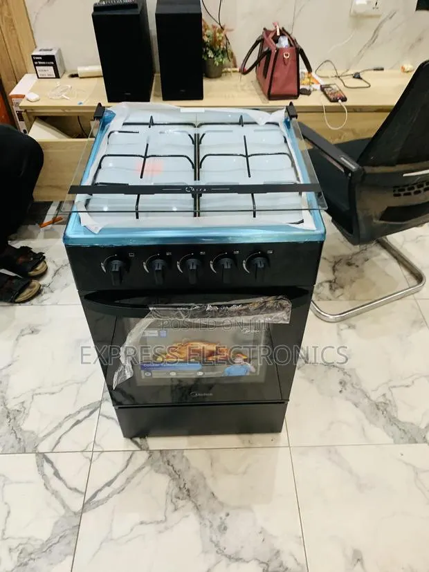 Very Cool Price Midea 4burner Oven Grill · Photo 1