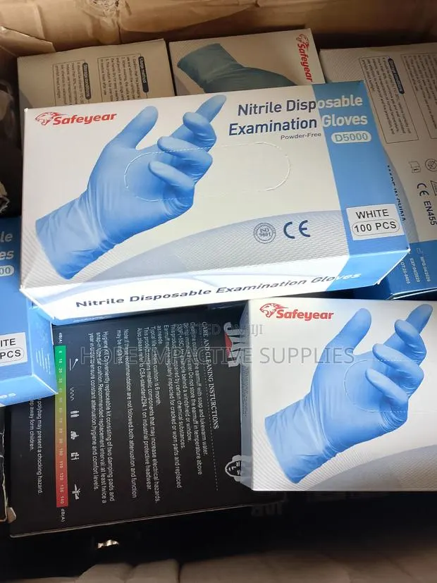 Quality Disposable Examination Nitrile Gloves. (White)<> Safeyear. · Photo 1