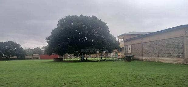 17 Plots With Warehouse For Sale Along Accra Nsawam Road · Photo 1
