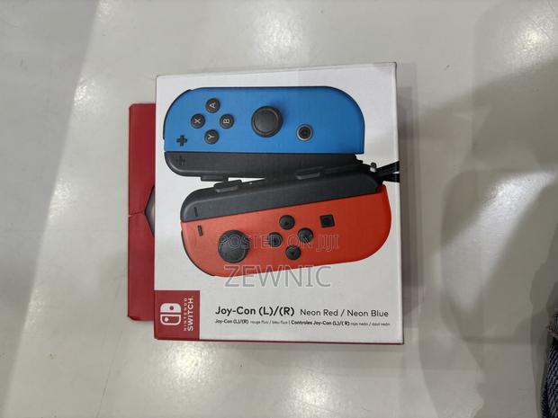 Nintendo Switch Joy-Con (L)/(R) Neon Red / Neon Blue · Photo 1