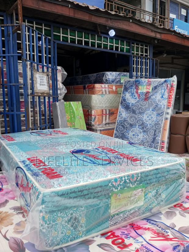 1 Half Mattress 12" High Density/Latex Foam · Photo 1