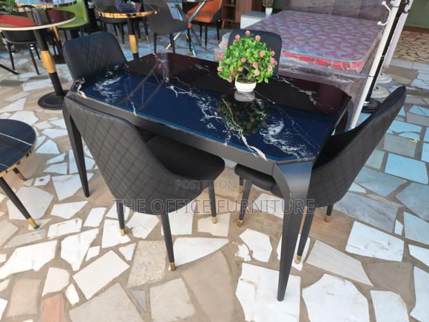 Four(4) Sitters Thick Marble Dining · Photo 1