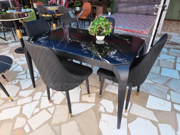 Four(4) Sitters Thick Marble Dining · Photo 2