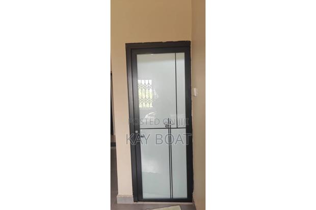 An Installed Washroom Door · Photo 1