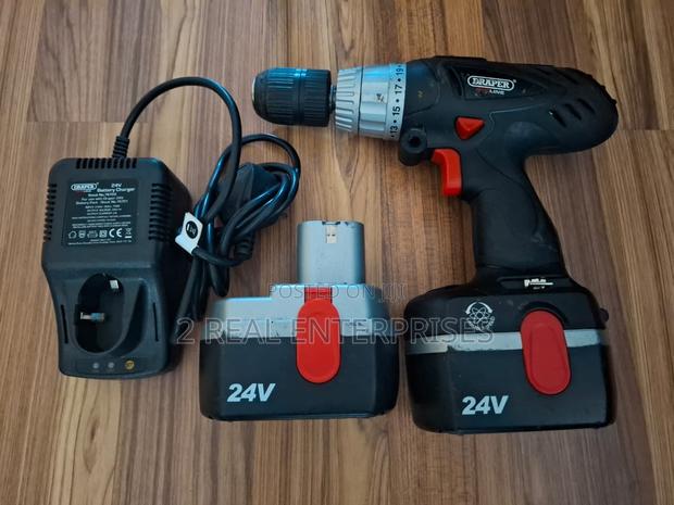 Draper 24 Volt Cordless Combi Hammer Drill With 2 Batteries · Photo 1