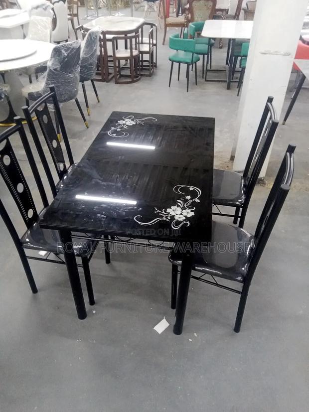 Simple 4 Seater Dining Table · Photo 2
