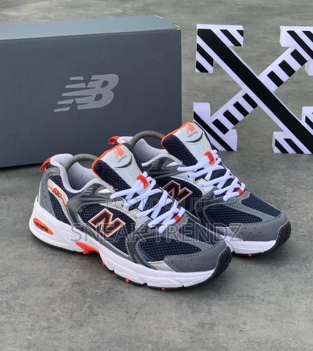 New Balance 530 Black Orange and Black · Photo 1