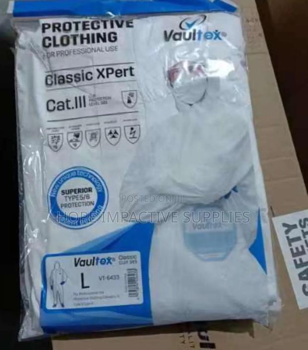 Vaultex Disposable Coverall. · Photo 1