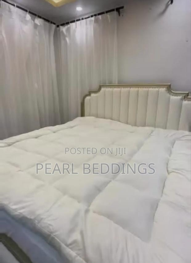 Premium Quality Extra Comfy Comfort and Cushioning Mattress Toppers · Photo 3
