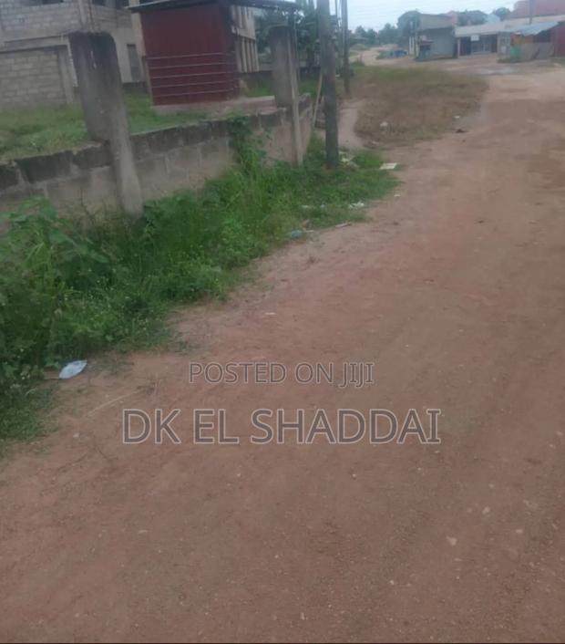2 Plots of Land at Pokuase · Photo 1